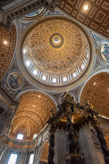 Rome, Italy - March 30, 2026 - Dome and baldachin of the main altar inside Saint Peters Basilica Rome © imagoDens