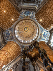 Rome, Italy - March 30, 2026 - Dome and baldachin of the main altar inside Saint Peters Basilica Rome © imagoDens