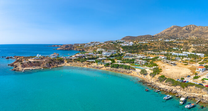 View of sea bay with beautiful beach and traditional church on Karpathos island in Ammopi village, Greece