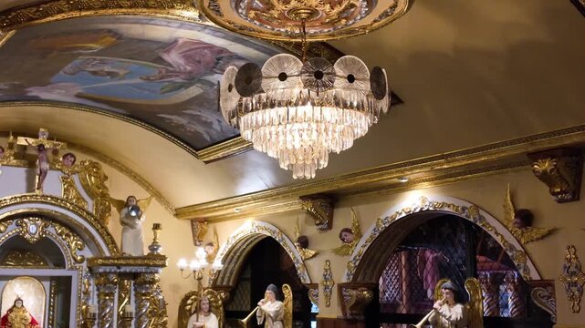 Crystal chandelier and ceiling mural at Simala Shrine in Cebu