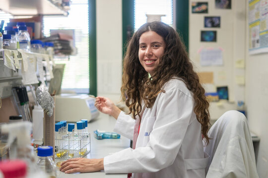 Female scientist working with test tubes