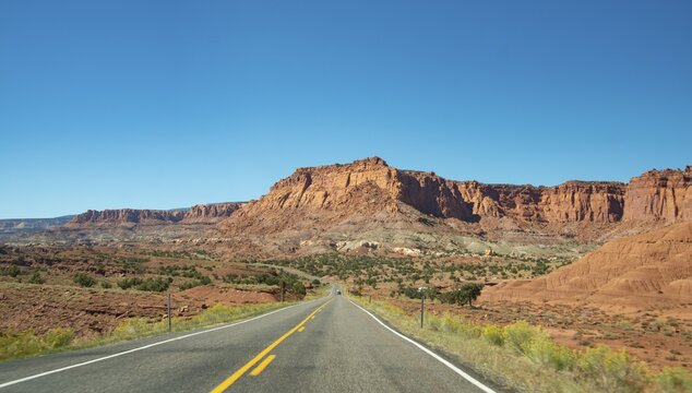 Red rugged sandstone cliffs on Highway 24, Capitol Reef National Park, Utah, Southwest, USA