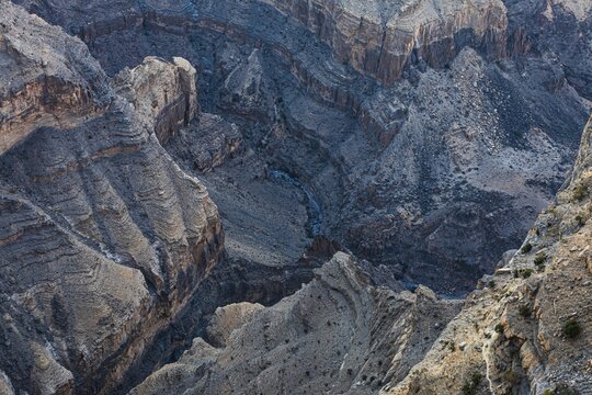 View from the Al Hayl mountain plateau into the rugged Wadi Nakhar of the Grand Canyon of Oman, Arabian Peninsula, Sultanate of Oman