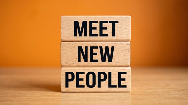 Meet New People, a motivational concept on wooden blocks, fostering connections and social interaction, perfect for business networking and community building visuals.