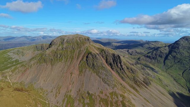 Aerial panoramic view of the Great Cable Summit from the Kirk Fell, located in Wasdale valley. Scenic Drone POV Exploration of the Lake District National Park, Cumbria, UK.