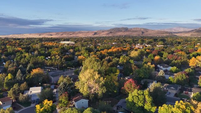 Sunrise over foothills of Rocky Mountains and city of Fort Collins in northern Colorado in early fall scenery