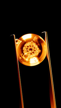 AI Molecule Suspended in Glowing Laboratory Chamber