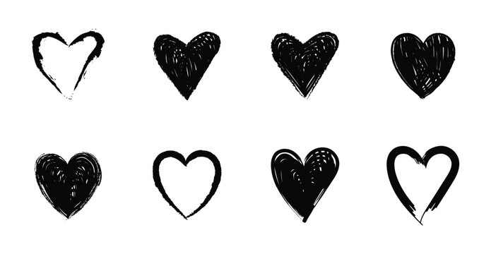 Grunge black hearts icons set. Collection of cute black brush stroke heart icons in expressive hand drawn styles.  Clean vector illustrations isolated on a white background for versatile design use.