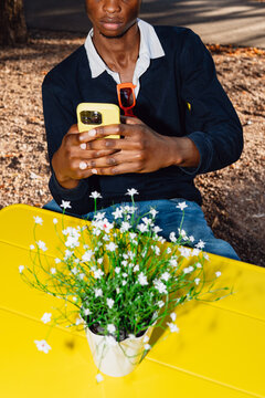 Using Smartphone At Outdoor Table