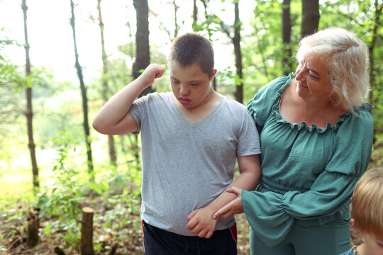 Children with Down syndrome are vacationing at a camp.