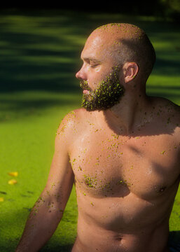 Peaceful Topless Man Portrait In Natural Green Pond