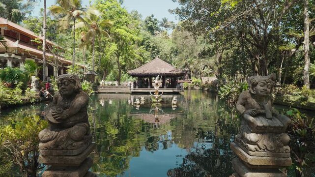 Pura Gunung Kawi Sebatu temple complex surrounded by lush tropical vegetation and sacred water ponds in Ubud, Bali, Indonesia