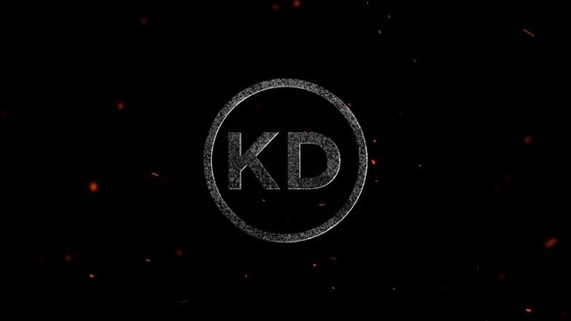 The letters KD inside a glowing circle with particles floating