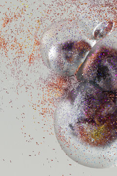Floating Glass Spheres with Purple and Orange Particles