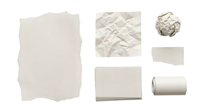 Collection of white paper pieces including torn sheets, a roll, and a crumpled ball on black