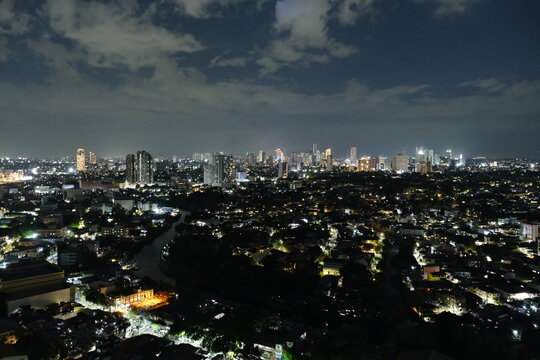 Illuminated Manila city skyline and modern skyscrapers at night Metro Manila Philippines
