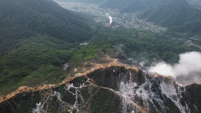 Drone video from the summit of an active volcano, Mount Sabayak, North Sumatra, Indonesia