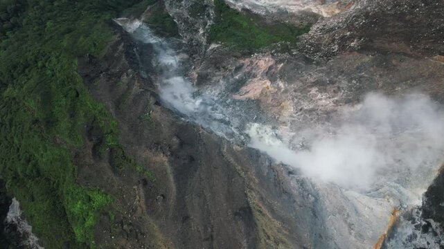 Drone video from the summit of an active volcano, Mount Sabayak, North Sumatra, Indonesia