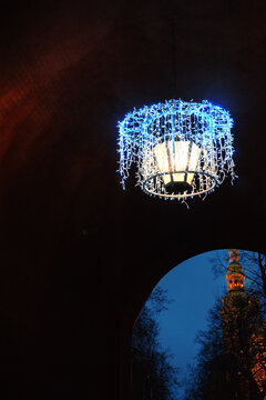Festive lantern illuminates a historic arch