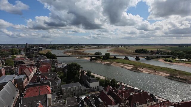 High view over IJssel river and grassy river banks in Deventer