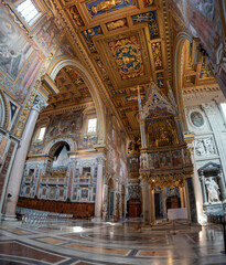 Rome, Italy - April 10, 2026 - Interior View Highlighting the Apse and Mosaics Behind the Gothic Baldachin of the Lateran Basilica, Rome © imagoDens