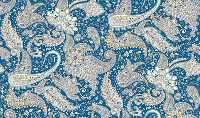 Seamless repeating pattern with paisley motifs placed at different angles, balanced by smaller floral elements and filler © Venkatsai