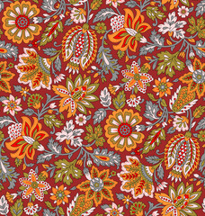 Seamless repeating pattern with paisley motifs placed at different angles, balanced by smaller floral elements and filler © Venkatsai