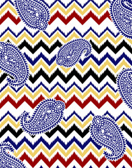 Seamless repeating pattern with paisley motifs placed at different angles, balanced by smaller floral elements and filler © Venkatsai