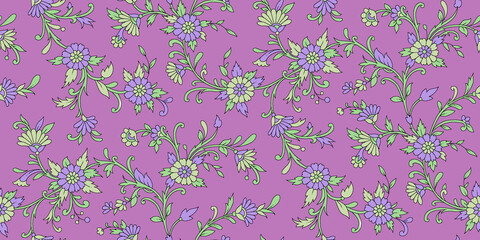 Seamless repeating pattern with paisley motifs placed at different angles, balanced by smaller floral elements and filler © Venkatsai
