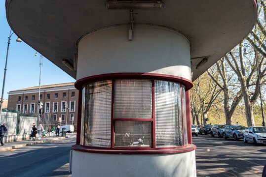 A detailed urban scene capturing vintage public transportation spot in the city center of Rome