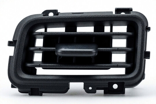 Close up of black car air vent component. Plastic automotive vent slat for climate control system. Interior dashboard part for vehicle ventilation. Detail of defroster nozzle AC outlet module in