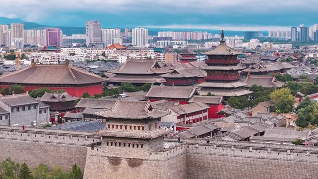Aerial view of Xi'an ancient city wall and traditional pagoda with modern skyline, China in Xi an, China