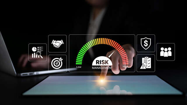Professional engaged in risk management with data visualization and risk assessment dashboard concept, highlighting key metrics and business strategy assessment.. Glyphic.