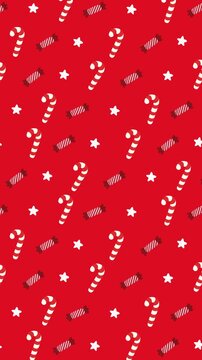 Seamless vertical scrolling pattern of candy canes and festive sweets