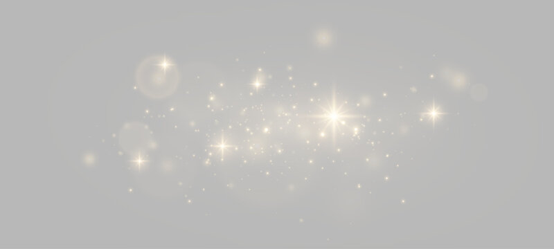 Golden light particles with glowing sparkles and soft bokeh. Magic stardust and shimmering glitter overlay effect for holiday design