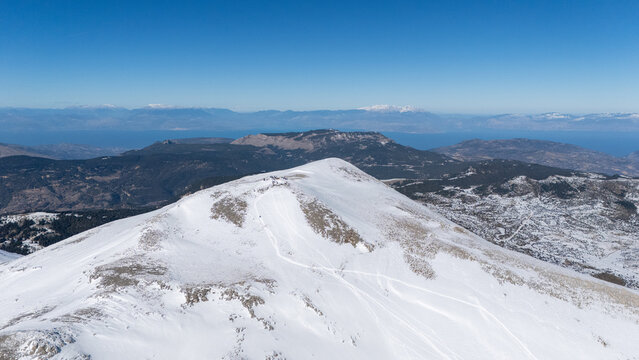Aerial view of snowy Mount Zireia summit in Corinthia, Greece, Mount Kyllini