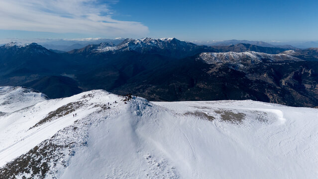 Aerial view of snowy Mount Zireia summit in Corinthia, Greece, Mount Kyllini