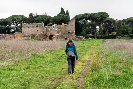 Female Tourist Walking Towards the Ninfeo della Villa dei Quintili Rome