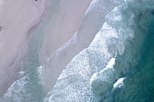 Abstract ocean tide pattern on empty shore The Concept of pure tranquility