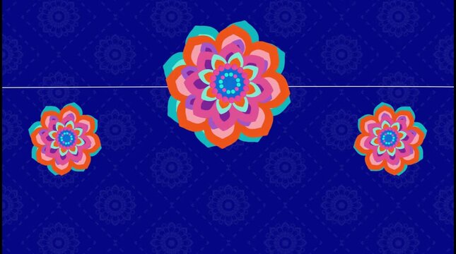 Colorful rangoli flower patterns on blue background for indian celebration