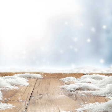 Winter product mockup with copy space &ndash; snowy mountain landscape and product placement. Clean space for product placement surrounded by fresh snow. Winter template for commercial campaigns.