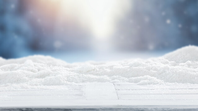Winter product mockup with copy space &ndash; snowy mountain landscape and product placement. Clean space for product placement surrounded by fresh snow. Winter template for commercial campaigns.