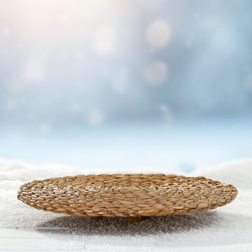 Winter product mockup with copy space &ndash; snowy mountain landscape and product placement. Clean space for product placement surrounded by fresh snow. Winter template for commercial campaigns.