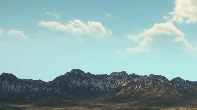 Breathtaking peaks rise majestically under a bright blue sky, showcasing rugged beauty and patches of snow. The landscape invites exploration and adventure in natures embrace.