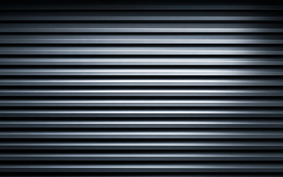 Dark gray horizontal louvers form modern geometric pattern. Minimalist metal slats create smooth parallel lines with subtle texture