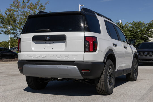 Honda Passport RTL Off-Road Midsize SUV at a dealership. Honda offers the Passport with a 285HP 3.5L V6 engine. MY:2026