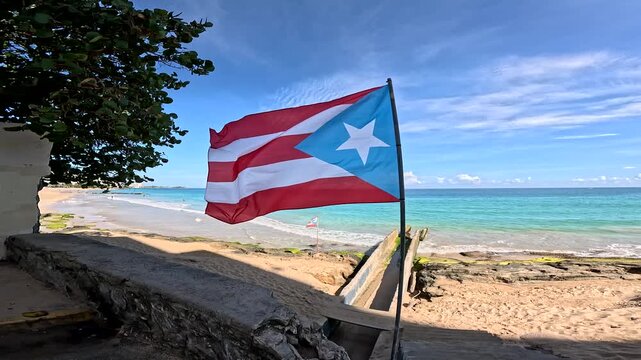 The Flag of Puerto Rico blowing in the wind near the beach in El Condado, San Juan 