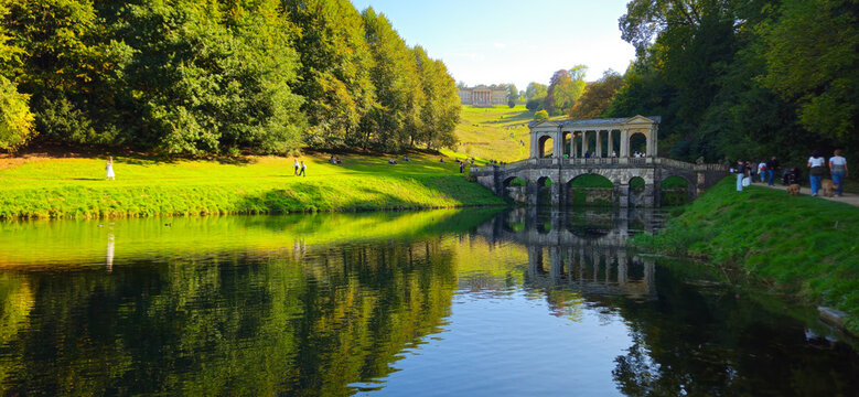 Palladian Bridge Reflected in Lake at Prior Park Landscape Garden Bath England