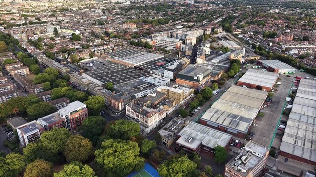 Aerial view of Londons Cricklewood, highlighting Clitterhouse Recreation Ground and the Access Self Storage hub before the distant skyline.