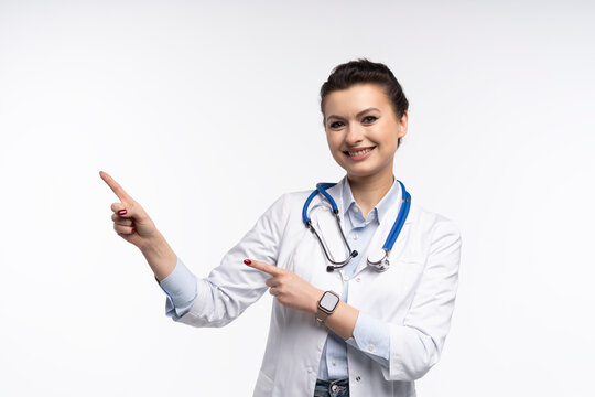 Medical doctor woman presenting and showing copy space for product or text